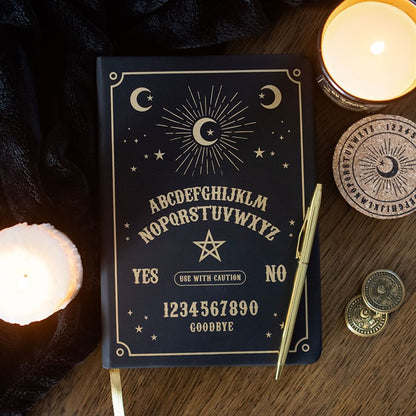 witchy notebook with black decor and gold print